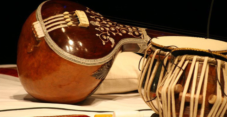 Tradional Musical Instruments Veena and Tabla on display.