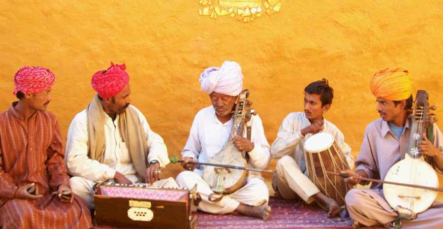 Traditional Folk Musicians of Rajasthan performing in an outdoor event.